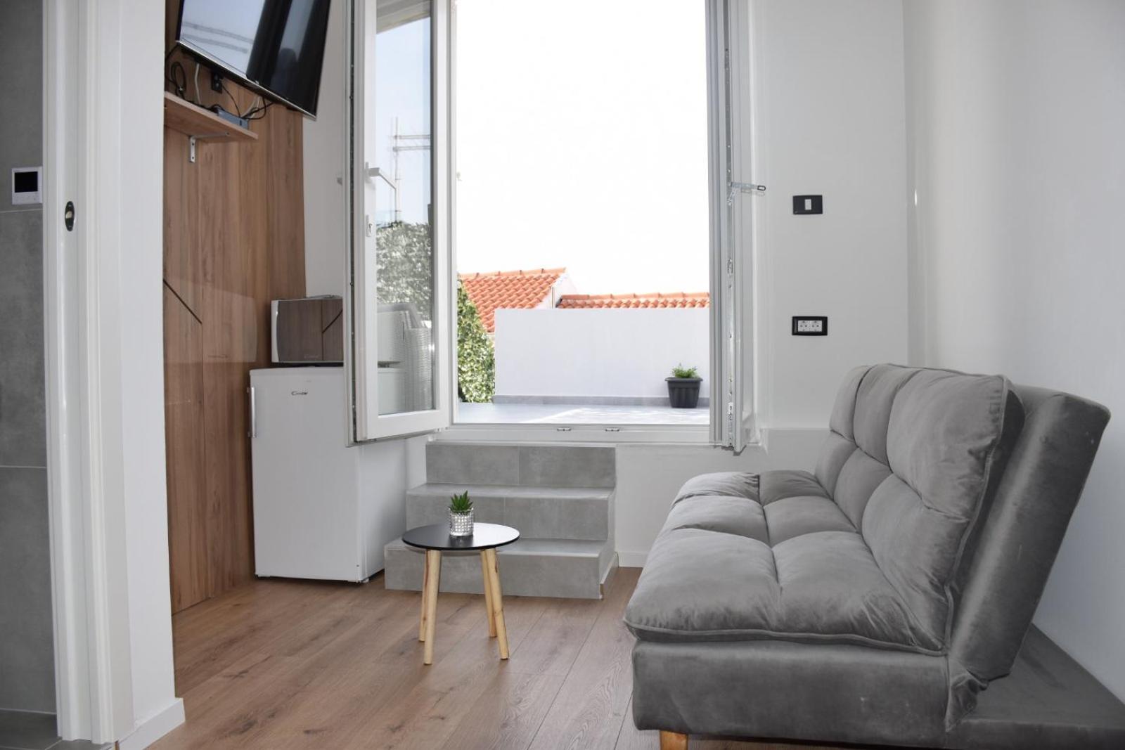 Apartman Lucana Apartment ตรีบูนย์ ภายนอก รูปภาพ